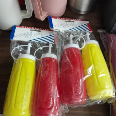 Metal folding camping table with camping supplies