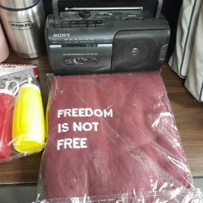 Metal folding camping table with camping supplies