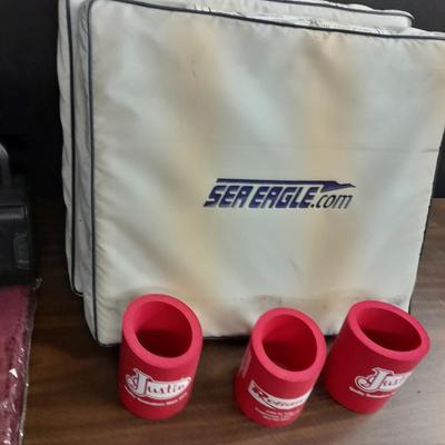 Metal folding camping table with camping supplies