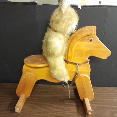 Wooden horse and Vintage teddy bear