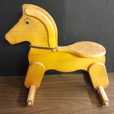 Wooden horse and Vintage teddy bear