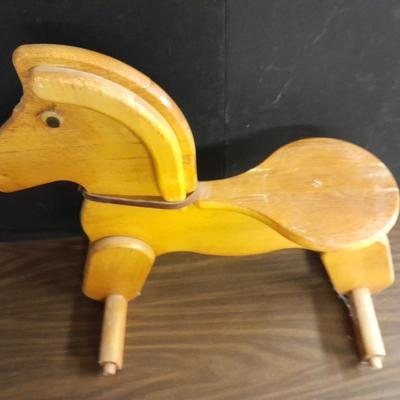Wooden horse and Vintage teddy bear