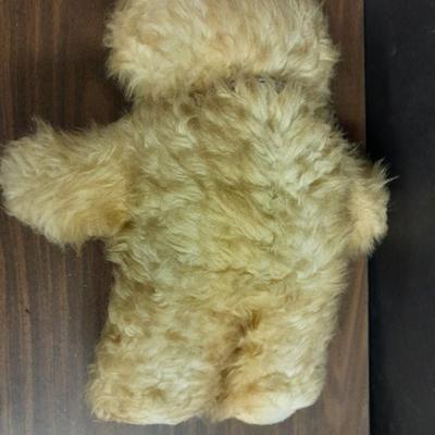 Wooden horse and Vintage teddy bear