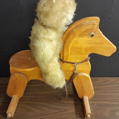 Wooden horse and Vintage teddy bear