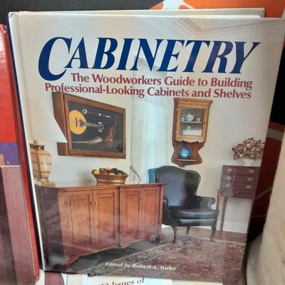 Hardback wood working books, and Woodsmith magazine back issues.