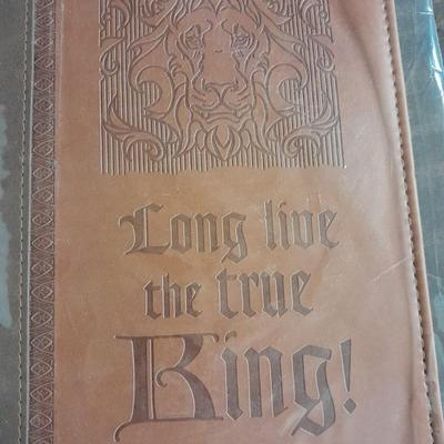Hard back and soft back books with a new bible cover