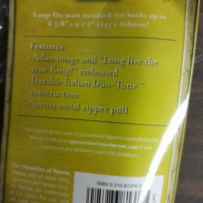 Hard back and soft back books with a new bible cover