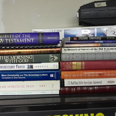 Hard back and soft back books with a new bible cover