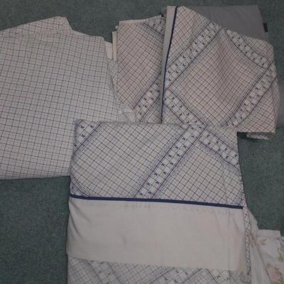 Two Queen sized sheet sets and a heated throw blanket