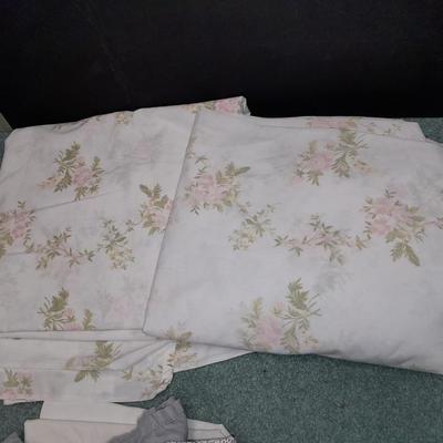 Two Queen sized sheet sets and a heated throw blanket