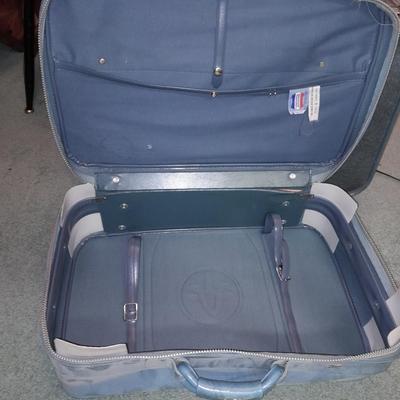 Two vintage suitcases and a leather like Garment bag Skyway & American tourist