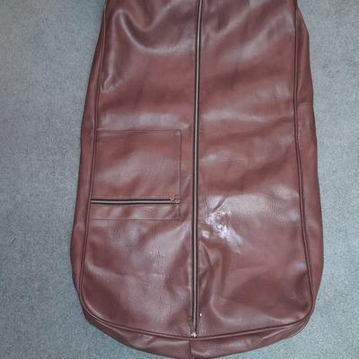 Two vintage suitcases and a leather like Garment bag Skyway & American tourist