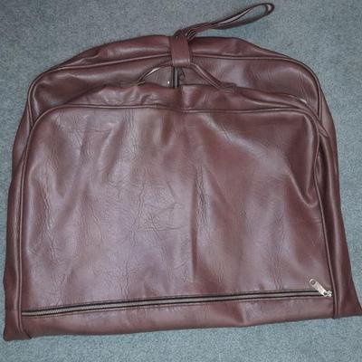 Two vintage suitcases and a leather like Garment bag Skyway & American tourist
