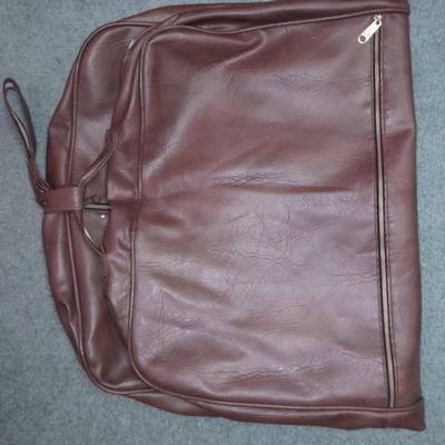 Two vintage suitcases and a leather like Garment bag Skyway & American tourist