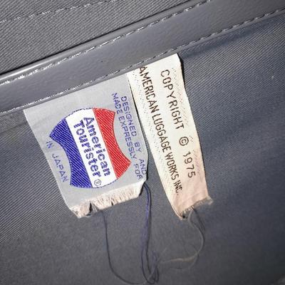 Two vintage suitcases and a leather like Garment bag Skyway & American tourist