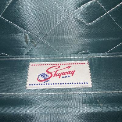 Two vintage suitcases and a leather like Garment bag Skyway & American tourist