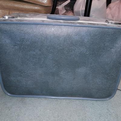 Two vintage suitcases and a leather like Garment bag Skyway & American tourist