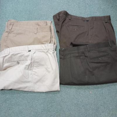 Four pairs of Men's Slacks 42 x 30, Cabela's 48 REG, Docker's 40 x 32