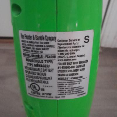 Two Swiffer mops and Swiffer pads