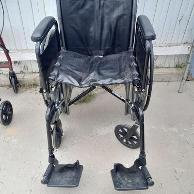 Drive folding Mobility chair wheelchair with removable leg rests.