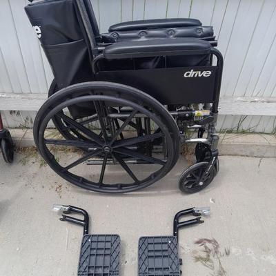 Drive folding Mobility chair wheelchair with removable leg rests.