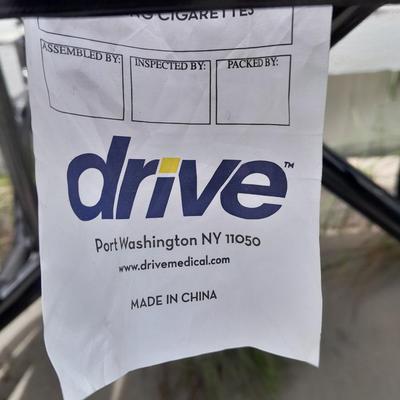 Drive folding Mobility chair wheelchair with removable leg rests.