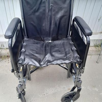 Drive folding Mobility chair wheelchair with removable leg rests.