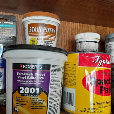 Folding door storage cabinet with Household and automobile chemicals