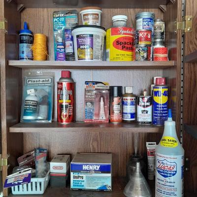 Folding door storage cabinet with Household and automobile chemicals