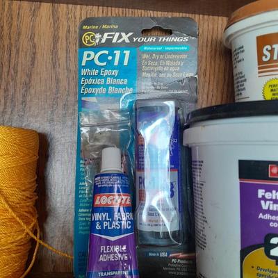 Folding door storage cabinet with Household and automobile chemicals