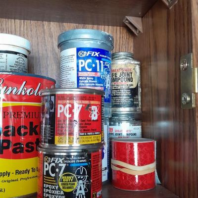 Folding door storage cabinet with Household and automobile chemicals