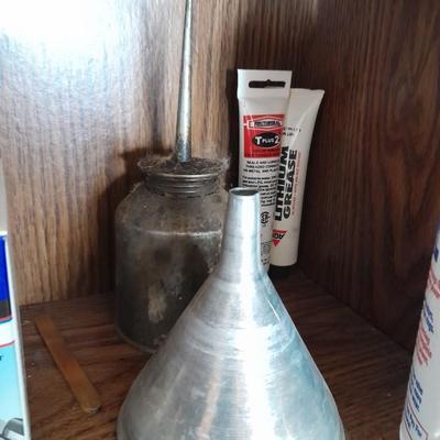 Folding door storage cabinet with Household and automobile chemicals