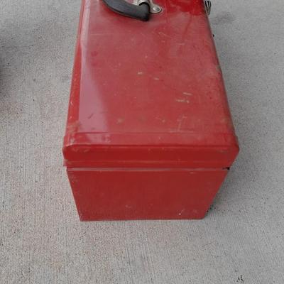 Red PROTO toolbox with plumbing connections, copper and brass