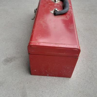 Red PROTO toolbox with plumbing connections, copper and brass