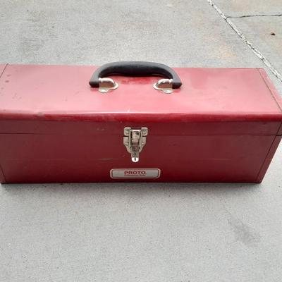 Red PROTO toolbox with plumbing connections, copper and brass