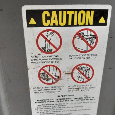 Craftsman multi-level step stool toolbox with wooden handled trowels and tools