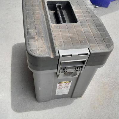 Craftsman multi-level step stool toolbox with wooden handled trowels and tools