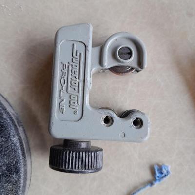 Plumbing tools, Pipe cutters, chalk line, and more