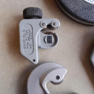 Plumbing tools, Pipe cutters, chalk line, and more