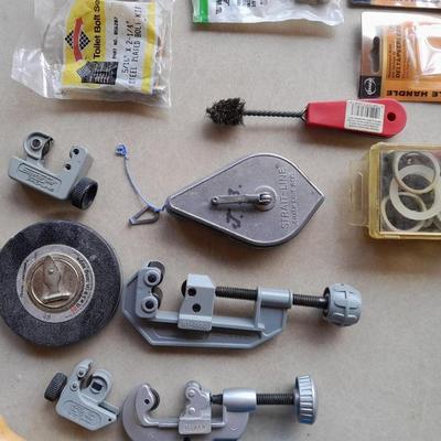 Plumbing tools, Pipe cutters, chalk line, and more
