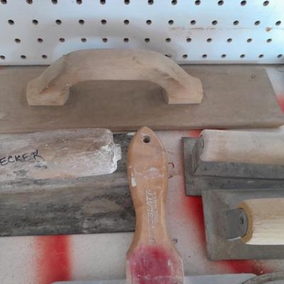 Assortment of trowels and other hand tools