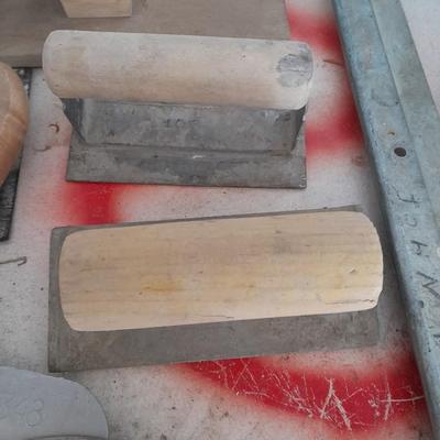 Assortment of trowels and other hand tools