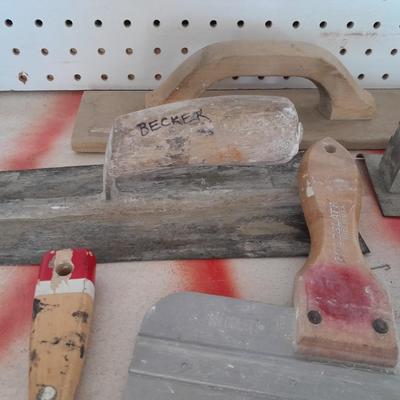 Assortment of trowels and other hand tools