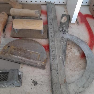 Assortment of trowels and other hand tools