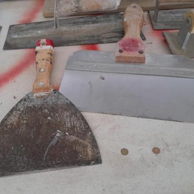 Assortment of trowels and other hand tools