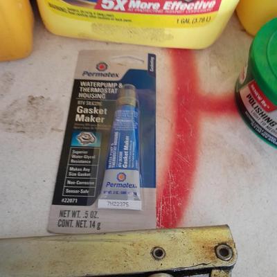 Automobile chemicals, and a Grease gun