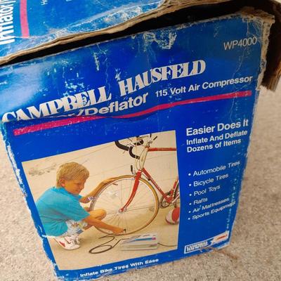 Campbell Hausfeld Inflater / decompressor 115 volt air compressor and a deluxe tire locking chock