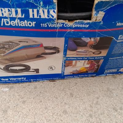 Campbell Hausfeld Inflater / decompressor 115 volt air compressor and a deluxe tire locking chock
