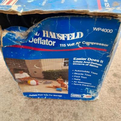 Campbell Hausfeld Inflater / decompressor 115 volt air compressor and a deluxe tire locking chock