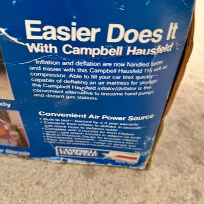 Campbell Hausfeld Inflater / decompressor 115 volt air compressor and a deluxe tire locking chock